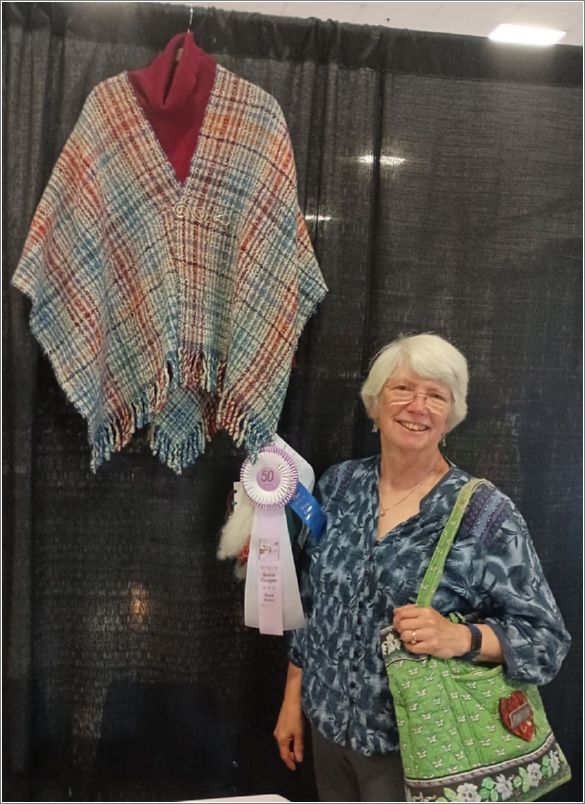 Marilyn Harrison with her woven shawl. Photo: Leigh Wheeler.